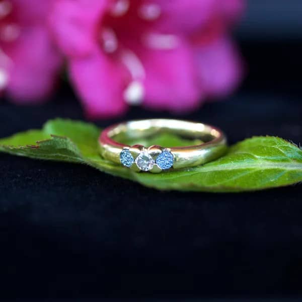 Osmium ring with diamonds